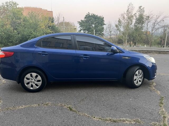 Синій Кіа Ріо, об'ємом двигуна 1.4 л та пробігом 166 тис. км за 6700 $, фото 2 на Automoto.ua