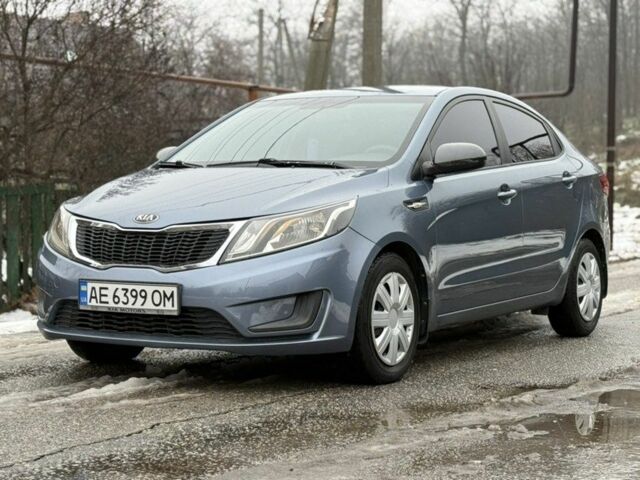 Синій Кіа Ріо, об'ємом двигуна 1.4 л та пробігом 120 тис. км за 7500 $, фото 1 на Automoto.ua