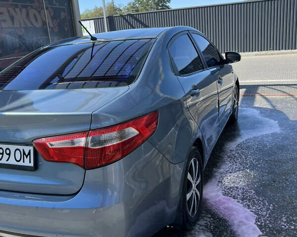 Синий Киа Рио, объемом двигателя 1.4 л и пробегом 120 тыс. км за 8700 $, фото 1 на Automoto.ua