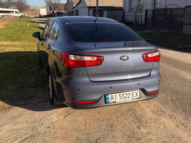 Синій Кіа Ріо, об'ємом двигуна 1.4 л та пробігом 81 тис. км за 9800 $, фото 8 на Automoto.ua