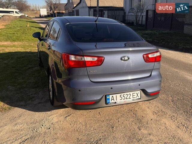 Синій Кіа Ріо, об'ємом двигуна 1.4 л та пробігом 81 тис. км за 9800 $, фото 9 на Automoto.ua