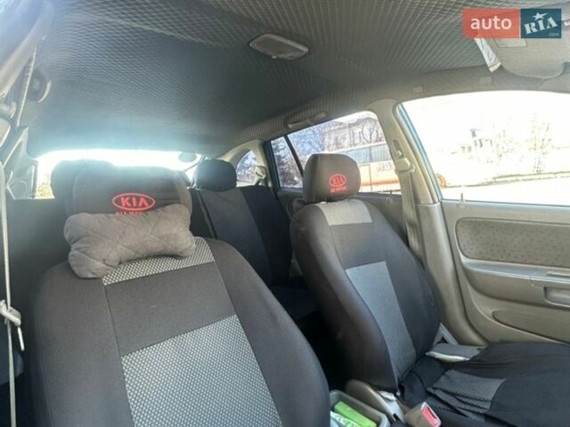 Синий Киа Рио, объемом двигателя 1.49 л и пробегом 243 тыс. км за 2400 $, фото 12 на Automoto.ua