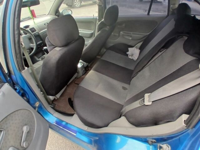 Синий Киа Рио, объемом двигателя 1.5 л и пробегом 250 тыс. км за 1900 $, фото 5 на Automoto.ua