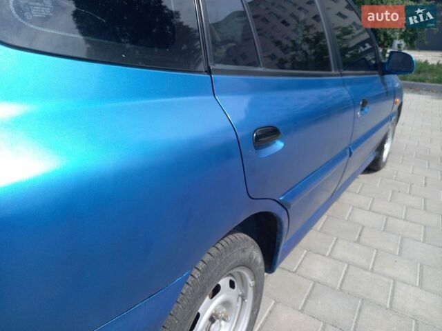 Синий Киа Рио, объемом двигателя 1.34 л и пробегом 262 тыс. км за 2600 $, фото 7 на Automoto.ua