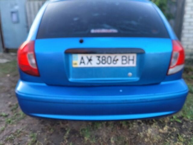 Синій Кіа Ріо, об'ємом двигуна 1.34 л та пробігом 255 тис. км за 2100 $, фото 2 на Automoto.ua
