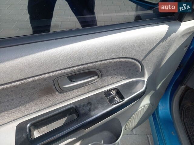 Синий Киа Рио, объемом двигателя 1.34 л и пробегом 262 тыс. км за 2600 $, фото 15 на Automoto.ua