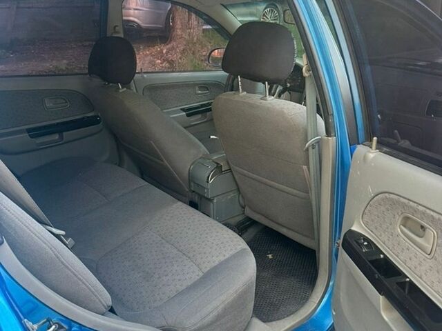 Синий Киа Рио, объемом двигателя 1.34 л и пробегом 250 тыс. км за 3200 $, фото 8 на Automoto.ua