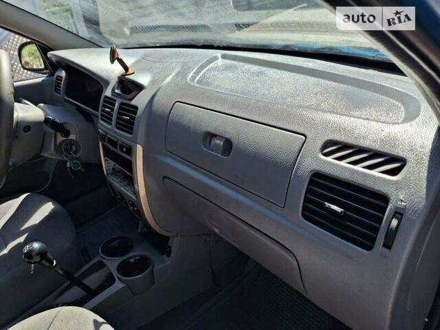 Синій Кіа Ріо, об'ємом двигуна 1.4 л та пробігом 231 тис. км за 2300 $, фото 27 на Automoto.ua