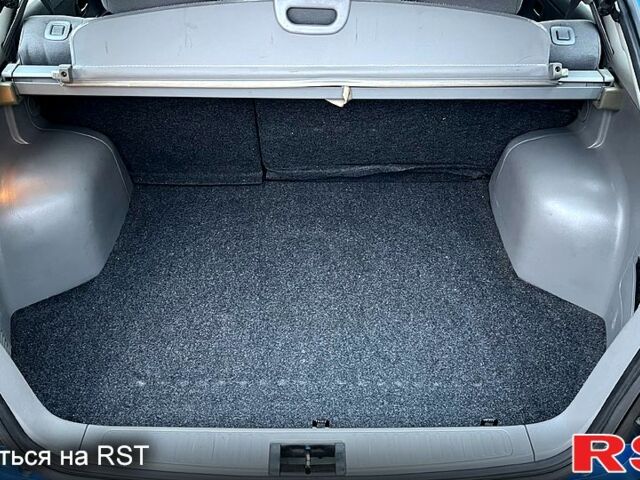 Синій Кіа Ріо, об'ємом двигуна 1.5 л та пробігом 167 тис. км за 4700 $, фото 8 на Automoto.ua