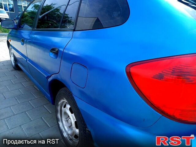 Синій Кіа Ріо, об'ємом двигуна 1.4 л та пробігом 262 тис. км за 2600 $, фото 5 на Automoto.ua