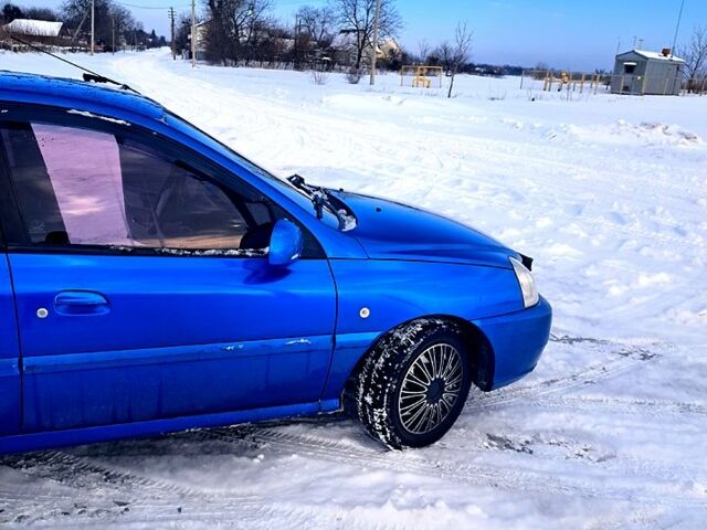 Синій Кіа Ріо, об'ємом двигуна 1.3 л та пробігом 239 тис. км за 2600 $, фото 5 на Automoto.ua