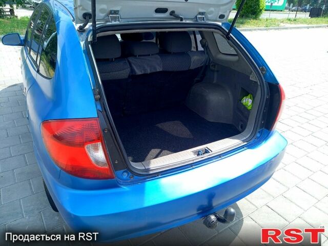 Синій Кіа Ріо, об'ємом двигуна 1.4 л та пробігом 262 тис. км за 2600 $, фото 7 на Automoto.ua