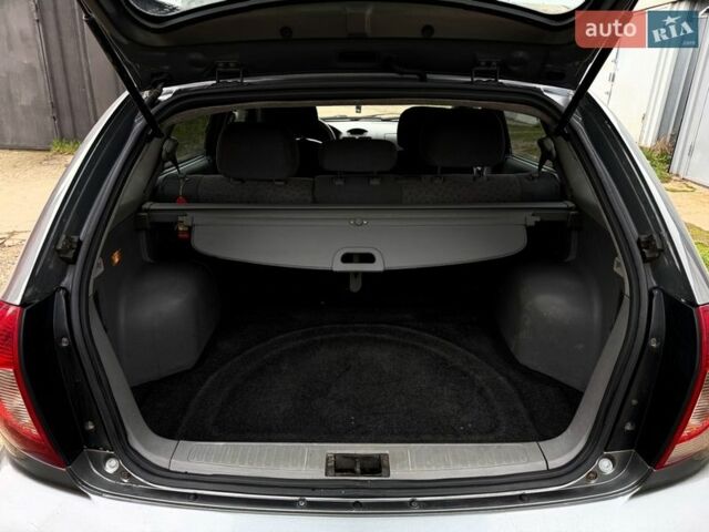 Синий Киа Рио, объемом двигателя 1.5 л и пробегом 364 тыс. км за 2550 $, фото 12 на Automoto.ua