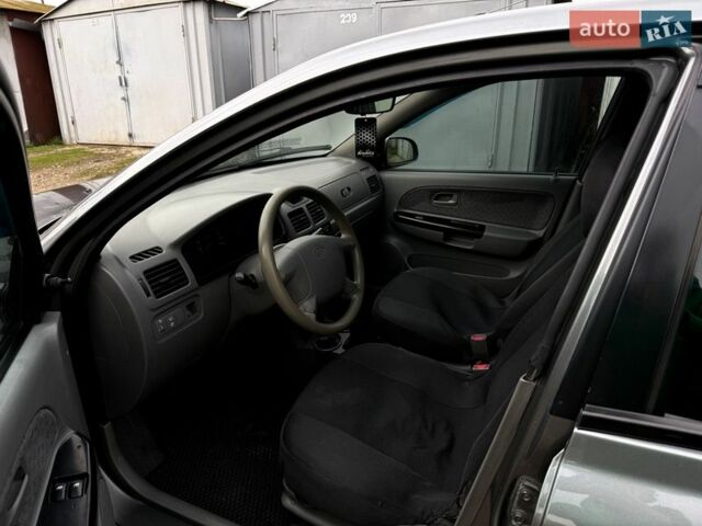 Синий Киа Рио, объемом двигателя 1.5 л и пробегом 364 тыс. км за 2550 $, фото 9 на Automoto.ua