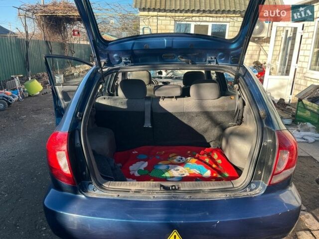 Синій Кіа Ріо, об'ємом двигуна 1.4 л та пробігом 192 тис. км за 2700 $, фото 4 на Automoto.ua