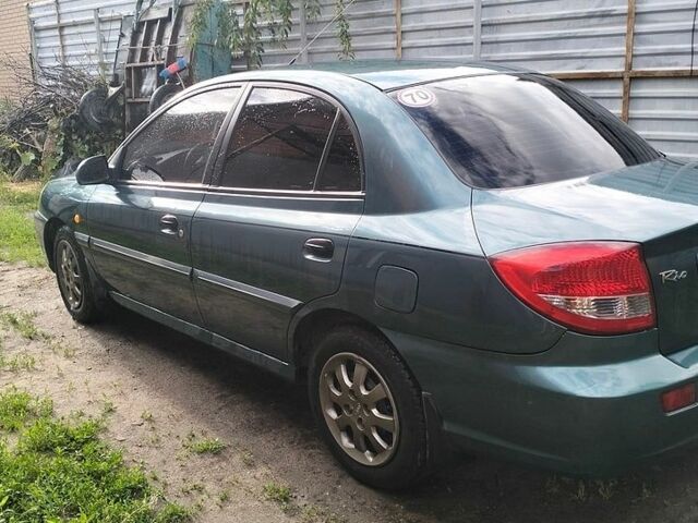 Зеленый Киа Рио, объемом двигателя 1.3 л и пробегом 129 тыс. км за 2800 $, фото 2 на Automoto.ua