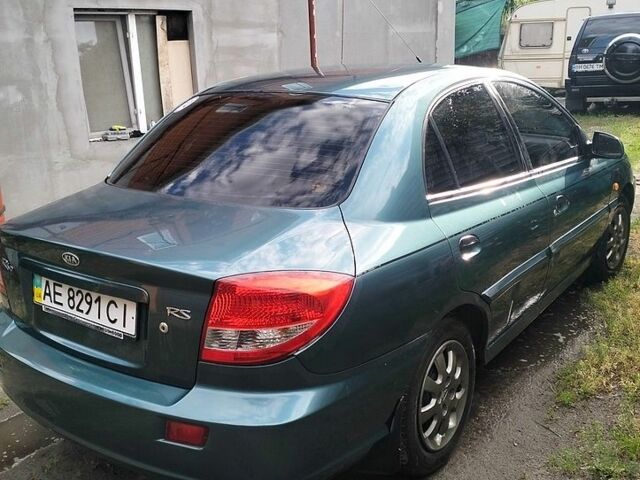 Зеленый Киа Рио, объемом двигателя 1.3 л и пробегом 129 тыс. км за 2800 $, фото 4 на Automoto.ua