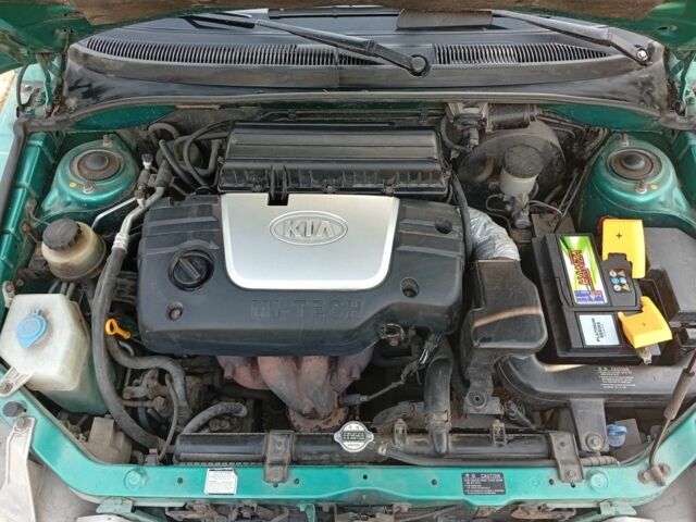 Зеленый Киа Рио, объемом двигателя 1.5 л и пробегом 270 тыс. км за 2600 $, фото 23 на Automoto.ua