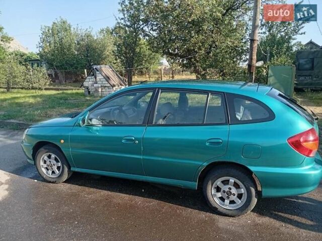 Зеленый Киа Рио, объемом двигателя 1.5 л и пробегом 270 тыс. км за 2600 $, фото 4 на Automoto.ua