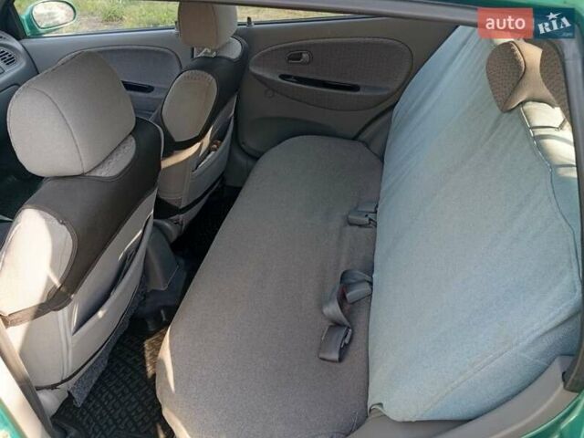 Зеленый Киа Рио, объемом двигателя 1.5 л и пробегом 270 тыс. км за 2600 $, фото 10 на Automoto.ua