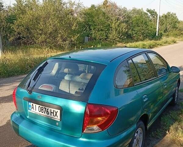 Зеленый Киа Рио, объемом двигателя 1.5 л и пробегом 270 тыс. км за 2600 $, фото 7 на Automoto.ua