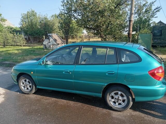 Зеленый Киа Рио, объемом двигателя 1.5 л и пробегом 270 тыс. км за 2600 $, фото 5 на Automoto.ua