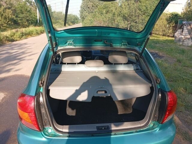 Зеленый Киа Рио, объемом двигателя 1.5 л и пробегом 270 тыс. км за 2600 $, фото 17 на Automoto.ua