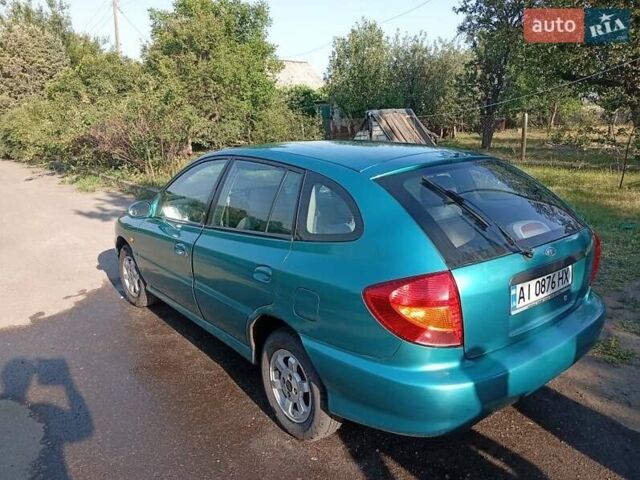 Зеленый Киа Рио, объемом двигателя 1.5 л и пробегом 270 тыс. км за 2600 $, фото 6 на Automoto.ua