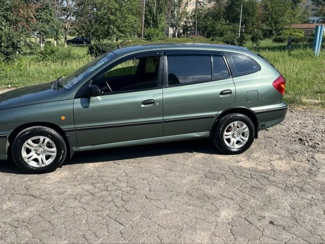 Зеленый Киа Рио, объемом двигателя 1.5 л и пробегом 128 тыс. км за 2802 $, фото 5 на Automoto.ua