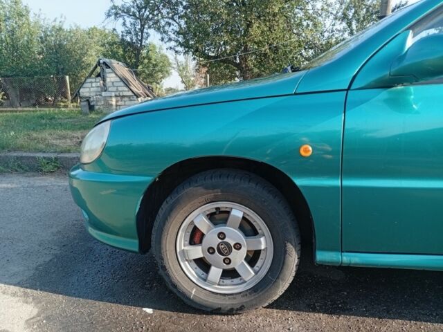 Зеленый Киа Рио, объемом двигателя 1.5 л и пробегом 270 тыс. км за 2600 $, фото 6 на Automoto.ua