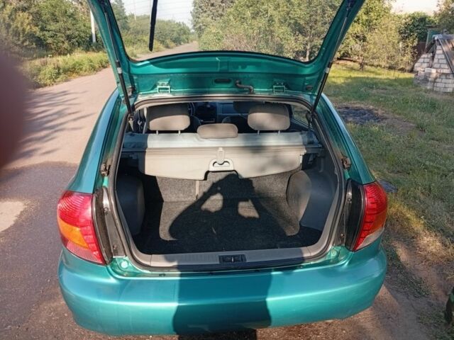 Зеленый Киа Рио, объемом двигателя 1.5 л и пробегом 270 тыс. км за 2600 $, фото 15 на Automoto.ua