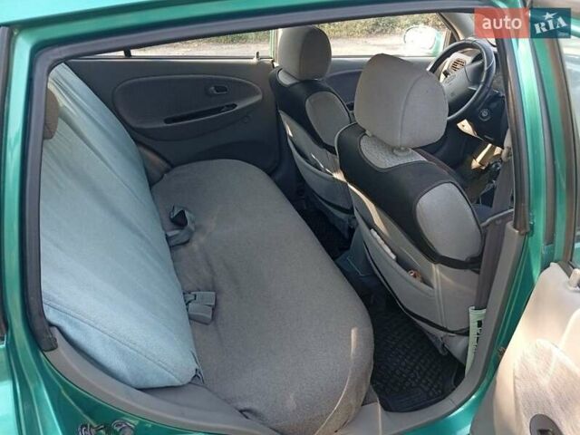 Зеленый Киа Рио, объемом двигателя 1.5 л и пробегом 270 тыс. км за 2600 $, фото 12 на Automoto.ua