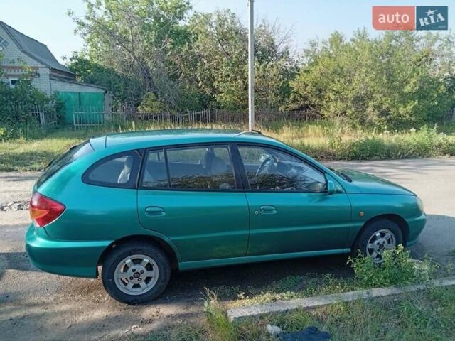 Зеленый Киа Рио, объемом двигателя 1.5 л и пробегом 270 тыс. км за 2600 $, фото 23 на Automoto.ua
