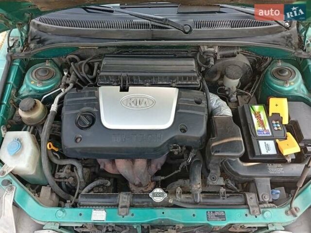 Зеленый Киа Рио, объемом двигателя 1.5 л и пробегом 270 тыс. км за 2600 $, фото 22 на Automoto.ua