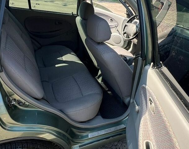 Зелений Кіа Ріо, об'ємом двигуна 1.49 л та пробігом 128 тис. км за 2700 $, фото 10 на Automoto.ua