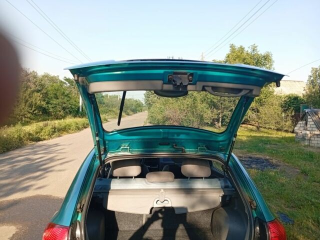 Зеленый Киа Рио, объемом двигателя 1.5 л и пробегом 270 тыс. км за 2600 $, фото 16 на Automoto.ua