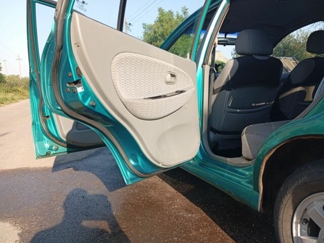 Зеленый Киа Рио, объемом двигателя 1.5 л и пробегом 270 тыс. км за 2600 $, фото 10 на Automoto.ua