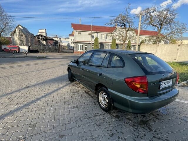 Зеленый Киа Рио, объемом двигателя 1.5 л и пробегом 180 тыс. км за 2300 $, фото 2 на Automoto.ua
