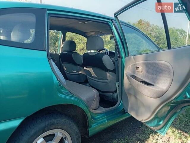 Зеленый Киа Рио, объемом двигателя 1.5 л и пробегом 270 тыс. км за 2600 $, фото 11 на Automoto.ua