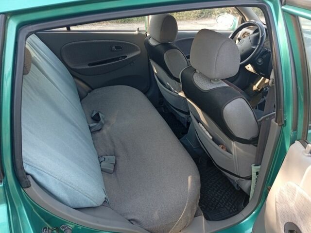 Зеленый Киа Рио, объемом двигателя 1.5 л и пробегом 270 тыс. км за 2600 $, фото 13 на Automoto.ua