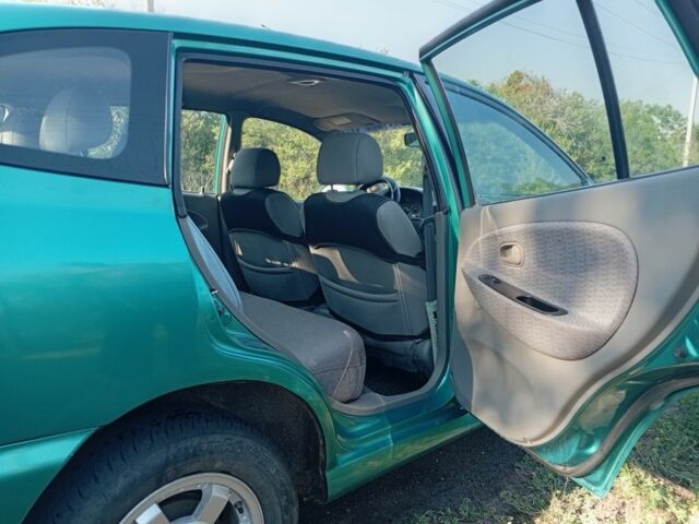 Зеленый Киа Рио, объемом двигателя 1.5 л и пробегом 270 тыс. км за 2600 $, фото 12 на Automoto.ua