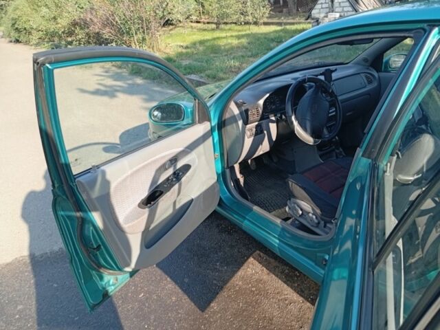 Зеленый Киа Рио, объемом двигателя 1.5 л и пробегом 270 тыс. км за 2600 $, фото 9 на Automoto.ua