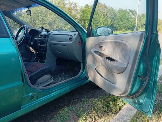 Зеленый Киа Рио, объемом двигателя 1.5 л и пробегом 270 тыс. км за 2600 $, фото 14 на Automoto.ua