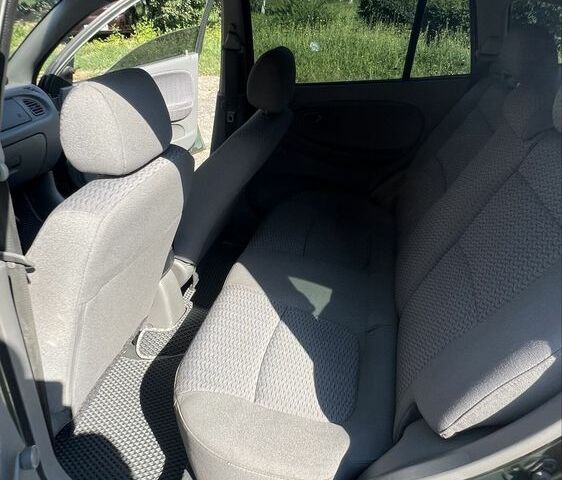 Зеленый Киа Рио, объемом двигателя 1.5 л и пробегом 128 тыс. км за 2802 $, фото 7 на Automoto.ua