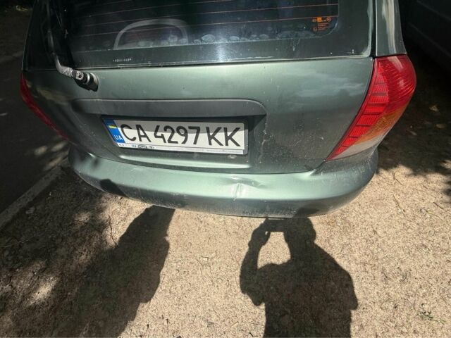 Зелений Кіа Ріо, об'ємом двигуна 1.5 л та пробігом 220 тис. км за 1900 $, фото 4 на Automoto.ua