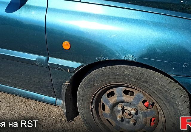 Зеленый Киа Рио, объемом двигателя 1.3 л и пробегом 240 тыс. км за 3000 $, фото 2 на Automoto.ua