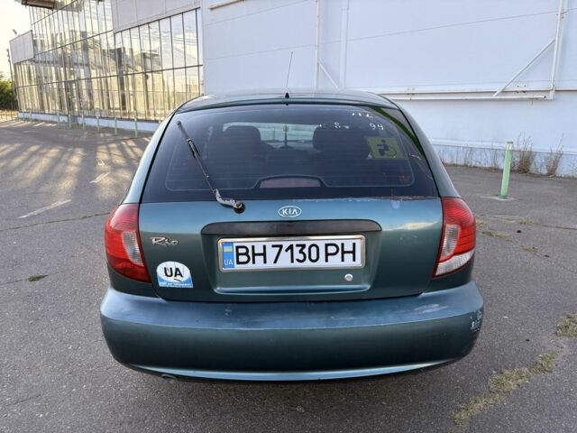 Зелений Кіа Ріо, об'ємом двигуна 1.3 л та пробігом 260 тис. км за 1904 $, фото 2 на Automoto.ua