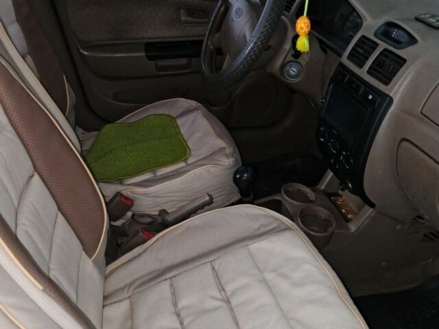 Зелений Кіа Ріо, об'ємом двигуна 1.3 л та пробігом 554 тис. км за 2800 $, фото 3 на Automoto.ua