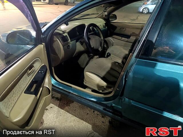 Зеленый Киа Рио, объемом двигателя 1.3 л и пробегом 0 тыс. км за 2500 $, фото 8 на Automoto.ua