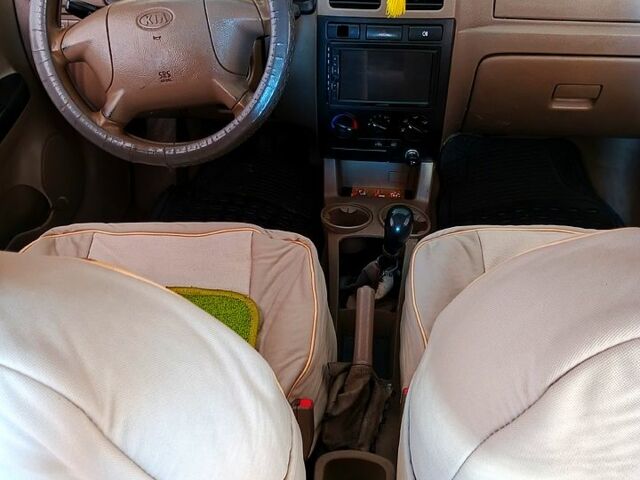 Зелений Кіа Ріо, об'ємом двигуна 1.3 л та пробігом 554 тис. км за 2700 $, фото 4 на Automoto.ua